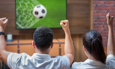 couple watching football