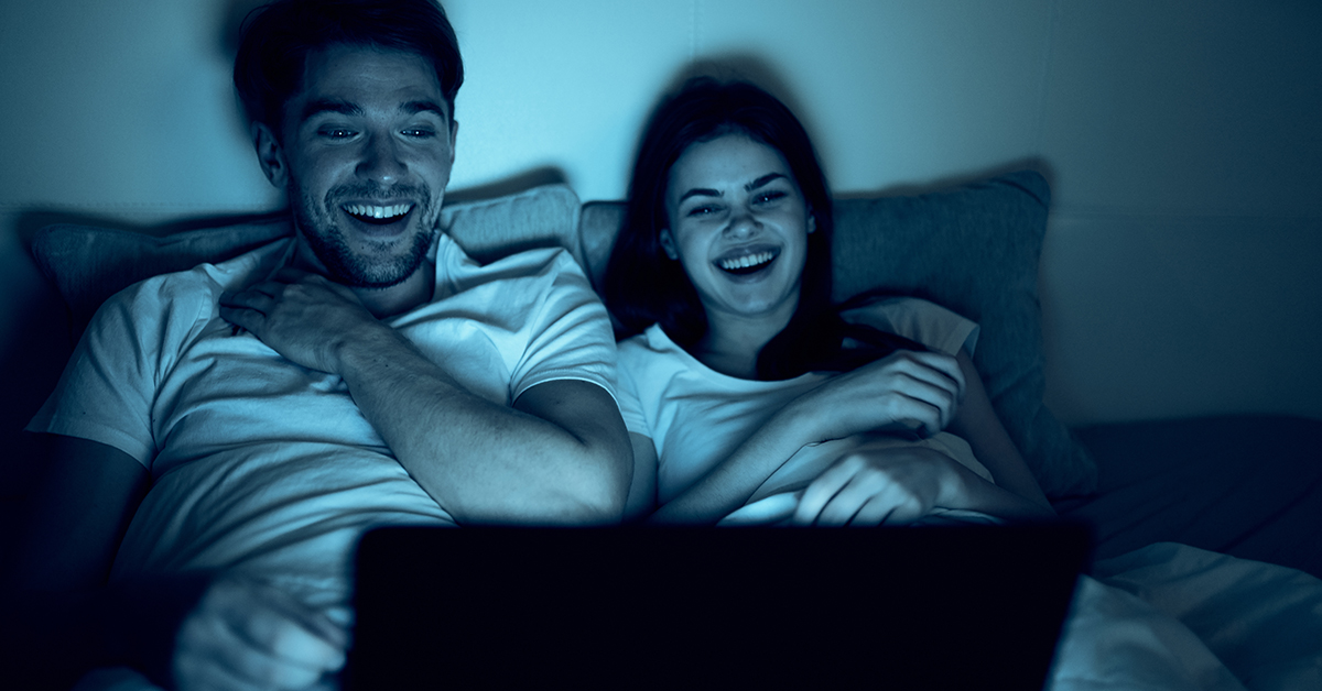 couple watching bed