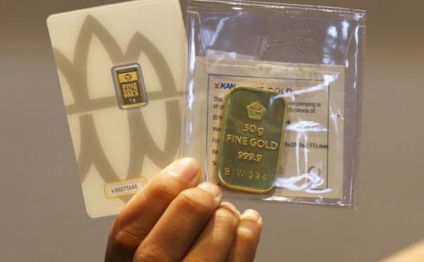 Harga Emas Antam Hari Ini Turun Rp48.000, Segini Rinciannya