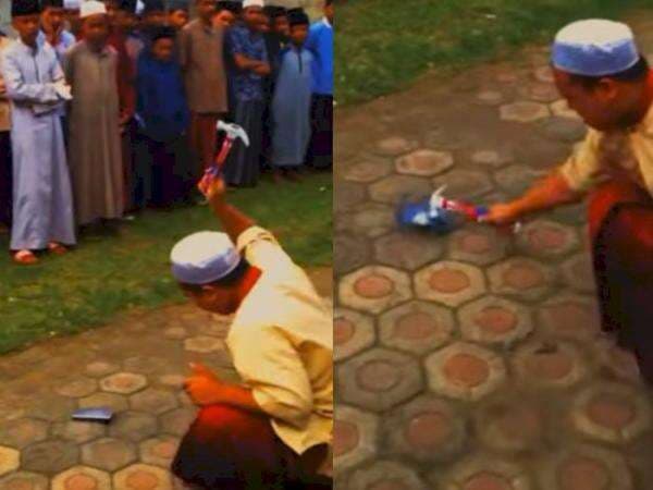 Viral Seorang Pria Diduga Pengurus Ponpes Hancurkan HP Pakai Palu, Ditonton Para Santri