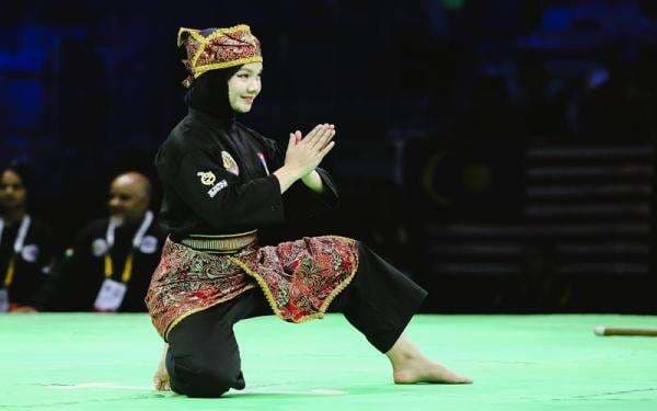 Alasan Merrywati Manuil, Atlet Pencak Silat yang Pakai Hijab Saat Tanding Meski Non Muslim