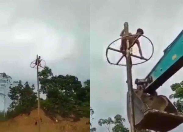 Tak Bisa Turun saat di Puncak, Pria Ikuti Lomba Panjat Pinang Ini Dievakuasi Pakai Alat Berat