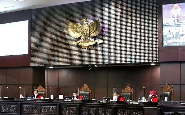 Dugaan Skandal Pemalsuan Putusan, Seluruh Hakim Konstitusi Dipolisikan