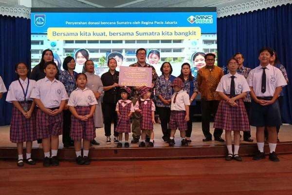 Gandeng MNC Peduli, Sekolah Regina Pacis Jakarta Salurkan Bantuan Bencana Sumatra