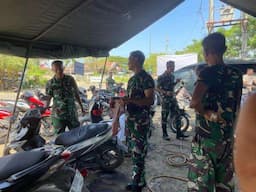 TNI Buka Jasa Perbaikan Sepeda Motor Bagi Korban Banjir Aceh