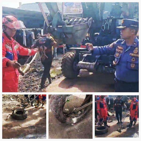 Penemuan Ular Piton 1,5 Meter di Ban Bekas Gegerkan Pekerja Jalan, Damkar Lakukan Evakuasi