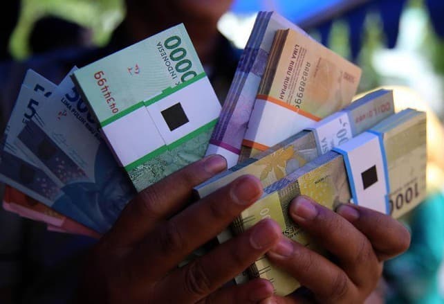 BI Catat Lonjakan Penukaran Uang, Tembus 1 Juta Orang Jelang Lebaran BI Catat Lonjakan Penukaran Uang, Tembus 1 Juta Orang Jelang Lebaran