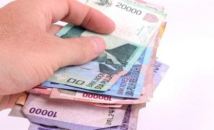 Uang Kembalian Diganti Permen, Awas Didenda Rp200 Juta