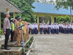 Satlantas Polres Pelalawan Sosialisasi Tertib Berlalulintas di SMPN 2 Bandar Sei Kijang 