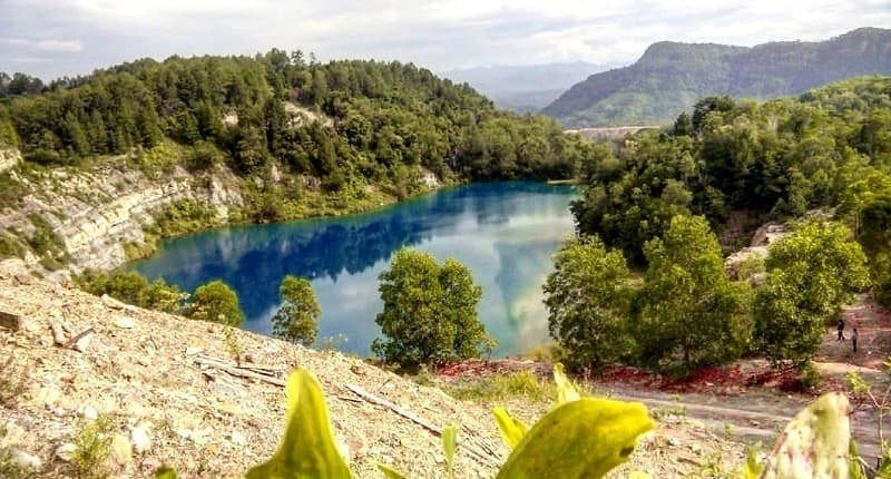 Mengenal Danau Biru Sawahlunto, Punya Pemandangan Cantik Tersembunyi di Gunung Batu