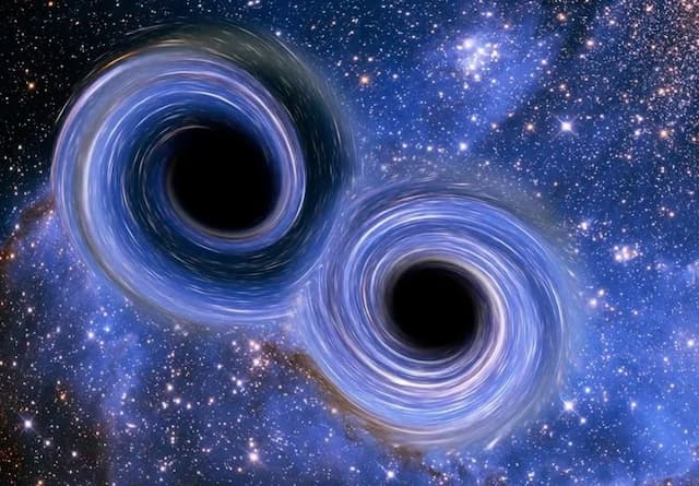 Dua Lubang Hitam Supermasif Bergabung di Tata Surya Dua Lubang Hitam Supermasif Bergabung di Tata Surya