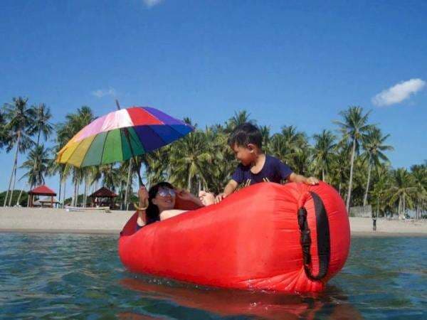 Pantai Lowita, Waikiki Beachnya Sulawesi: Pantainya Landai Banyak Spot Foto Instagramable Pantai Lowita, Waikiki Beachnya Sulawesi: Pantainya Landai Banyak Spot Foto Instagramable