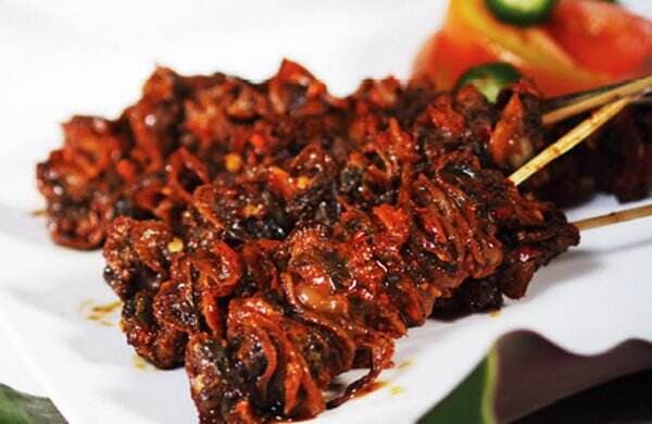 Sensasi Menyantap Sate Lolak, Daging Siput yang Ternyata Begitu Lezat Sensasi Menyantap Sate Lolak, Daging Siput yang Ternyata Begitu Lezat