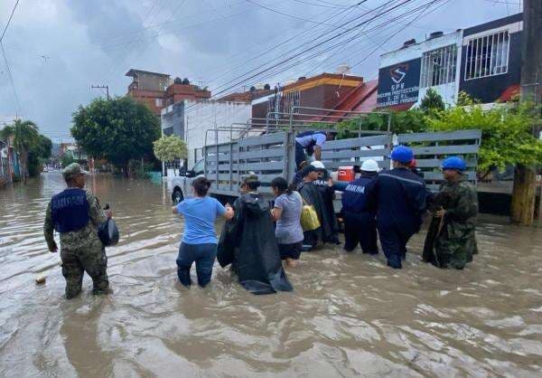 Hujan Deras dan Banjir Hantam Meksiko Tengah, Ratusan Orang Tewas atau Hilang Hujan Deras dan Banjir Hantam Meksiko Tengah, Ratusan Orang Tewas atau Hilang