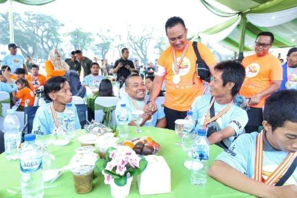 FOTO: Momen Penyandang Disabilitas dan ABK Ikuti Bukit Barisan Fun Run 5K di Medan FOTO: Momen Penyandang Disabilitas dan ABK Ikuti Bukit Barisan Fun Run 5K di Medan