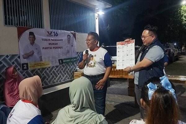 Caleg Perindo Edukasi Cara Mencoblos Surat Suara Pemilu di Surabaya
