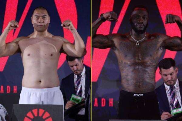 Prosesi Timbang Badan, Zhang Zhilei Lebih Berat 68,2 pound ketimbang Deontay Wilder Prosesi Timbang Badan, Zhang Zhilei Lebih Berat 68,2 pound ketimbang Deontay Wilder