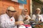 Suswono Blusukan Bareng Istri ke Tanah Abang, Diajak Sarapan Nasi Uduk Betawi Suswono Blusukan Bareng Istri ke Tanah Abang, Diajak Sarapan Nasi Uduk Betawi